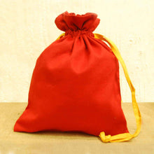 Handcrafted Ikat Potli (Vibrant Orange)