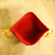 Handcrafted Ikat Potli (Vibrant Orange)