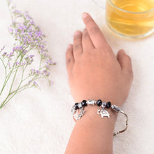 Handcrafted Charm Bracelet With Black and Silver Beads