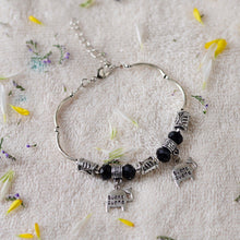 Handcrafted Charm Bracelet With Black and Silver Beads